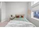 Cozy bedroom with a plush bed, soft lighting, and stylish decor at 7240 W Custer Ave # 119, Lakewood, CO 80226