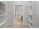 Walk-in closet leading to a bathroom at 7240 W Custer Ave # 119, Lakewood, CO 80226