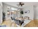 Bright living room featuring large windows, hardwood floors, and modern decor at 7240 W Custer Ave # 119, Lakewood, CO 80226