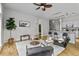 Spacious open-concept living space showcasing kitchen, seating area, and stylish decor at 7240 W Custer Ave # 119, Lakewood, CO 80226
