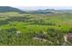 Expansive land featuring lush greenery and mountain views at 14271 Timber Trl, Larkspur, CO 80118