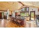 Spacious kitchen featuring a large island with seating, stainless steel appliances and beautiful wood cabinetry at 14271 Timber Trl, Larkspur, CO 80118