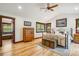 Cozy bedroom with rustic furnishings and a view of the wooded surroundings at 14271 Timber Trl, Larkspur, CO 80118