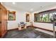 Room featuring wood windows, door, trim, black flooring and natural light at 14271 Timber Trl, Larkspur, CO 80118
