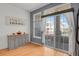 Bright dining area with sliding doors that lead to a large balcony at 1443 S Emporia Ct, Aurora, CO 80247