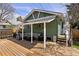 Spacious wooden deck with ample seating, perfect for outdoor entertaining at 1777 Spruce St, Denver, CO 80220