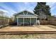 Inviting outdoor area featuring a large wooden deck with comfortable lounge furniture at 1777 Spruce St, Denver, CO 80220
