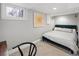 Basement bedroom with gray walls, carpet and queen size bed at 1777 Spruce St, Denver, CO 80220
