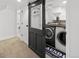 Finished laundry room with high efficiency washer and dryer at 1777 Spruce St, Denver, CO 80220