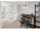 Basement office area with desk and carpeted floor at 1777 Spruce St, Denver, CO 80220