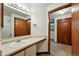 Bathroom featuring sink, mirror, and shower stall at 2960 Shadow Creek Dr # 201, Boulder, CO 80303