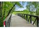 Stroll the serene bridge for a walk through nature and beautiful views in the community at 2960 Shadow Creek Dr # 201, Boulder, CO 80303