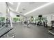 Community gym with treadmills, weight machines, and fitness equipment with large windows at 2960 Shadow Creek Dr # 201, Boulder, CO 80303