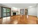 Bright living room with hardwood floors, fireplace, and sliding door to a balcony at 2960 Shadow Creek Dr # 201, Boulder, CO 80303