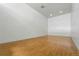 Empty racquetball court with hardwood floor at 2960 Shadow Creek Dr # 201, Boulder, CO 80303