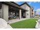 Outdoor patio with spacious yard and covered area, perfect for relaxation at 6429 Stable View St, Castle Pines, CO 80108