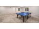Finished basement with a ping pong table, ideal for recreation and entertainment at 6429 Stable View St, Castle Pines, CO 80108