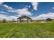 Community park featuring a playground, picnic area, and plenty of open green space at 6429 Stable View St, Castle Pines, CO 80108