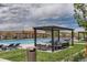 Resort-style pool with lounge chairs and shaded cabanas for relaxing by the water at 6429 Stable View St, Castle Pines, CO 80108