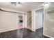 Finished basement featuring new tile and access to a fireplace and additional rooms for recreation at 8075 Sunset Dr, Lakewood, CO 80214