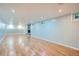 Large finished basement with fireplace, offering versatile space for recreation and relaxation at 8075 Sunset Dr, Lakewood, CO 80214
