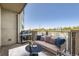 Cozy balcony featuring a grill and comfortable seating with a great view at 1313 S Clarkson St # 205, Denver, CO 80210