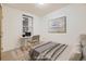Bedroom with a stylish desk and artwork at 1313 S Clarkson St # 205, Denver, CO 80210