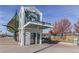 Exterior daytime shot of Louisiana-Pearl building with elevator and signage, near foliage and walking area at 1313 S Clarkson St # 205, Denver, CO 80210