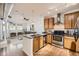 Modern kitchen featuring granite countertops, stainless steel appliances, and hardwood floors at 1313 S Clarkson St # 205, Denver, CO 80210