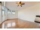 Bright living area featuring hardwood floors and natural light at 1313 S Clarkson St # 205, Denver, CO 80210