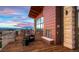 Stunning outdoor deck with fireplace and mountain views, perfect for entertaining or relaxing at 722 Eva Peak Dr, Erie, CO 80516