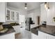 Charming kitchen with white cabinets, granite counters and stainless steel appliances at 4017 King St, Denver, CO 80211