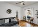 Inviting living room with hardwood floors, a comfortable couch, and stylish decor, perfect for relaxing at 4017 King St, Denver, CO 80211