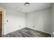 Bedroom with window, neutral walls, and modern wood-look flooring at 68 N Quicksilver Ave, Castle Rock, CO 80104