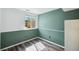 Bright bedroom featuring stylish two-tone walls, wood floors and a window letting in natural light at 68 N Quicksilver Ave, Castle Rock, CO 80104
