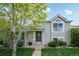 Charming two-story home featuring a well-maintained lawn and inviting front entrance, creating curb appeal at 68 N Quicksilver Ave, Castle Rock, CO 80104
