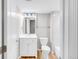 Modern bathroom with a stylish vanity, sleek mirror, and tiled shower at 186 S 45Th Ave, Brighton, CO 80601