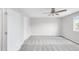 A neutral-colored bedroom with a ceiling fan and closet, offering a serene space at 186 S 45Th Ave, Brighton, CO 80601