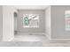 Bright dining room featuring modern chandelier and light wood-look flooring at 186 S 45Th Ave, Brighton, CO 80601