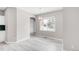 Bright, open dining room with modern chandelier and open archway to kitchen at 186 S 45Th Ave, Brighton, CO 80601