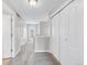 Spacious hallway with carpet floors and multiple doors leading to other rooms at 186 S 45Th Ave, Brighton, CO 80601