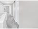 Upstairs hallway featuring modern doors and carpeted floor at 186 S 45Th Ave, Brighton, CO 80601