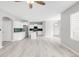 Spacious living room with an open concept kitchen, creating a welcoming space at 186 S 45Th Ave, Brighton, CO 80601