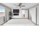 Serene main bedroom featuring a cozy fireplace, TV, and neutral decor at 186 S 45Th Ave, Brighton, CO 80601