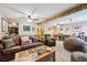 Finished basement with wood trim featuring a comfortable lounge area, desk, and decorative pillows at 148 S Holman Way, Golden, CO 80401