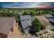 Aerial view of a suburban neighborhood showcasing the home's well-maintained landscaping and proximity to other houses at 12951 Vallejo Cir, Denver, CO 80234