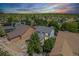 Aerial view of the house showing its well-maintained yard and proximity to other homes in a suburban neighborhood at 12951 Vallejo Cir, Denver, CO 80234