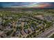 Wide aerial shot of a residential area near shopping, showcasing the community's layout and convenience at 12951 Vallejo Cir, Denver, CO 80234