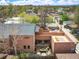 Wide aerial view of the home with multiple roof top decks and patio for backyard entertaining at 469 Elati St, Denver, CO 80204
