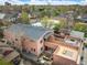Expansive aerial view of the property, showcasing multiple outdoor living spaces and the neighborhood surroundings at 469 Elati St, Denver, CO 80204